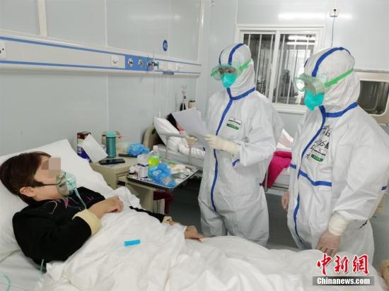 综合消息：全国累计确诊病例近6万 湖北病例激增有因