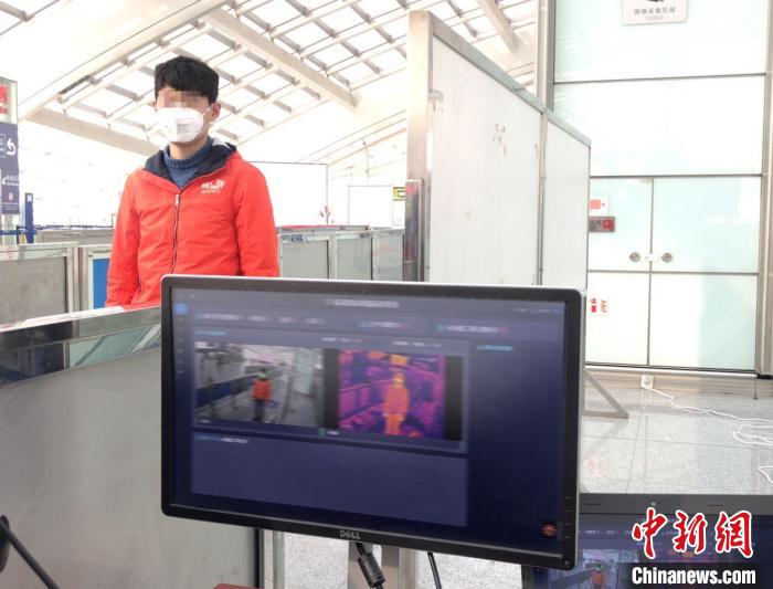 AI智慧防疫解决方案区域通行模块在北京首都机场3号航站楼站投入使用 商汤科技 供图 摄